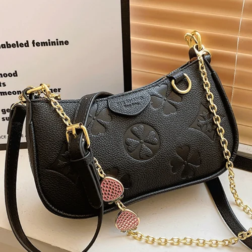 In 2024, the new fashion classic Joker body print pattern design metal chain decoration design underarm baguette bag is suitable