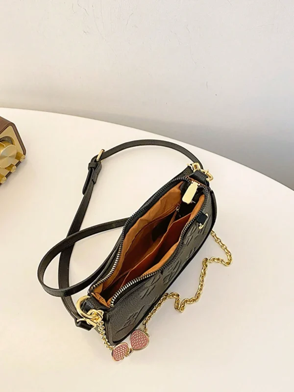 In 2024, the new fashion classic Joker body print pattern design metal chain decoration design underarm baguette bag is suitable - Image 5